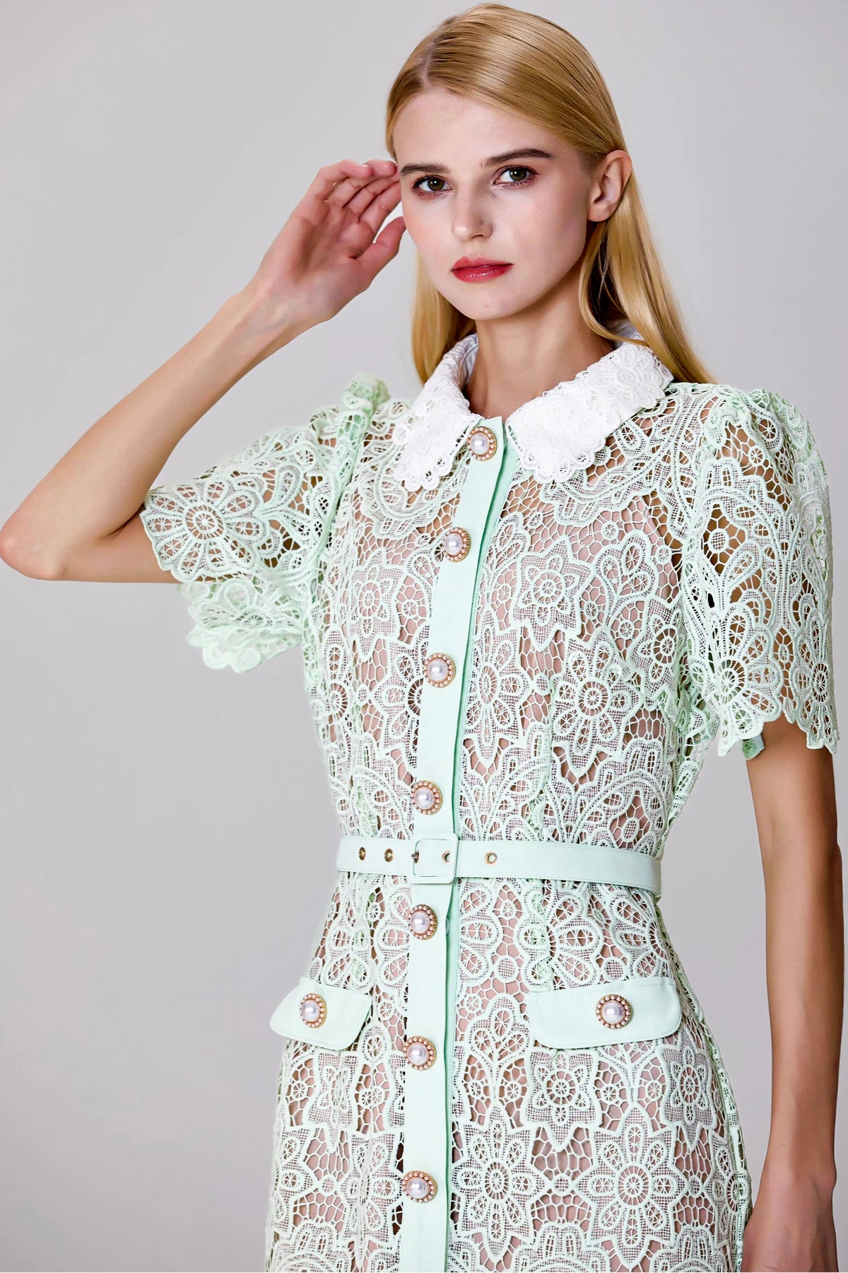 elegant light green lace dress with button-down front and belt