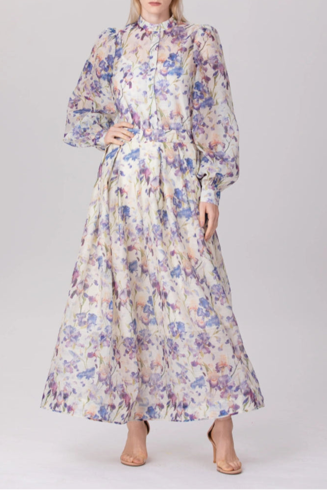 woman wearing floral co-ord set with blouse and maxi skirt