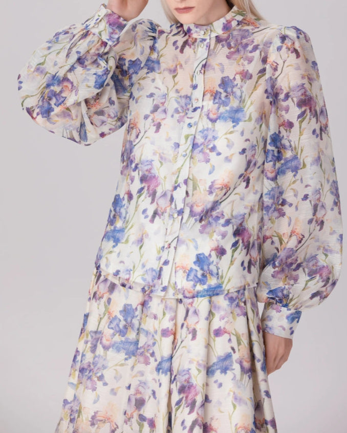 long sleeve sheer blouse with high collar and matching skirt