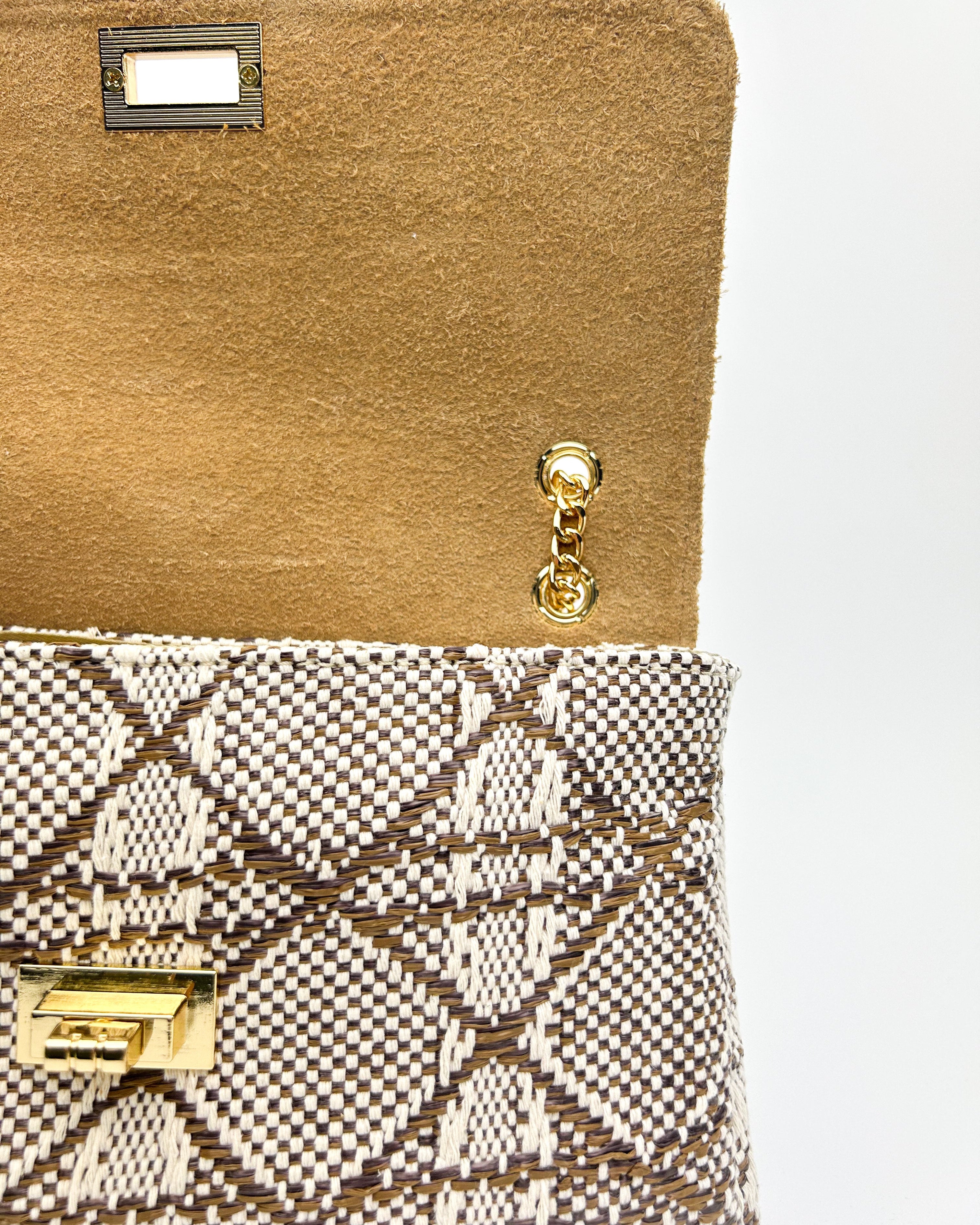 Interior view of Emma blue bag showing leather lining and pockets