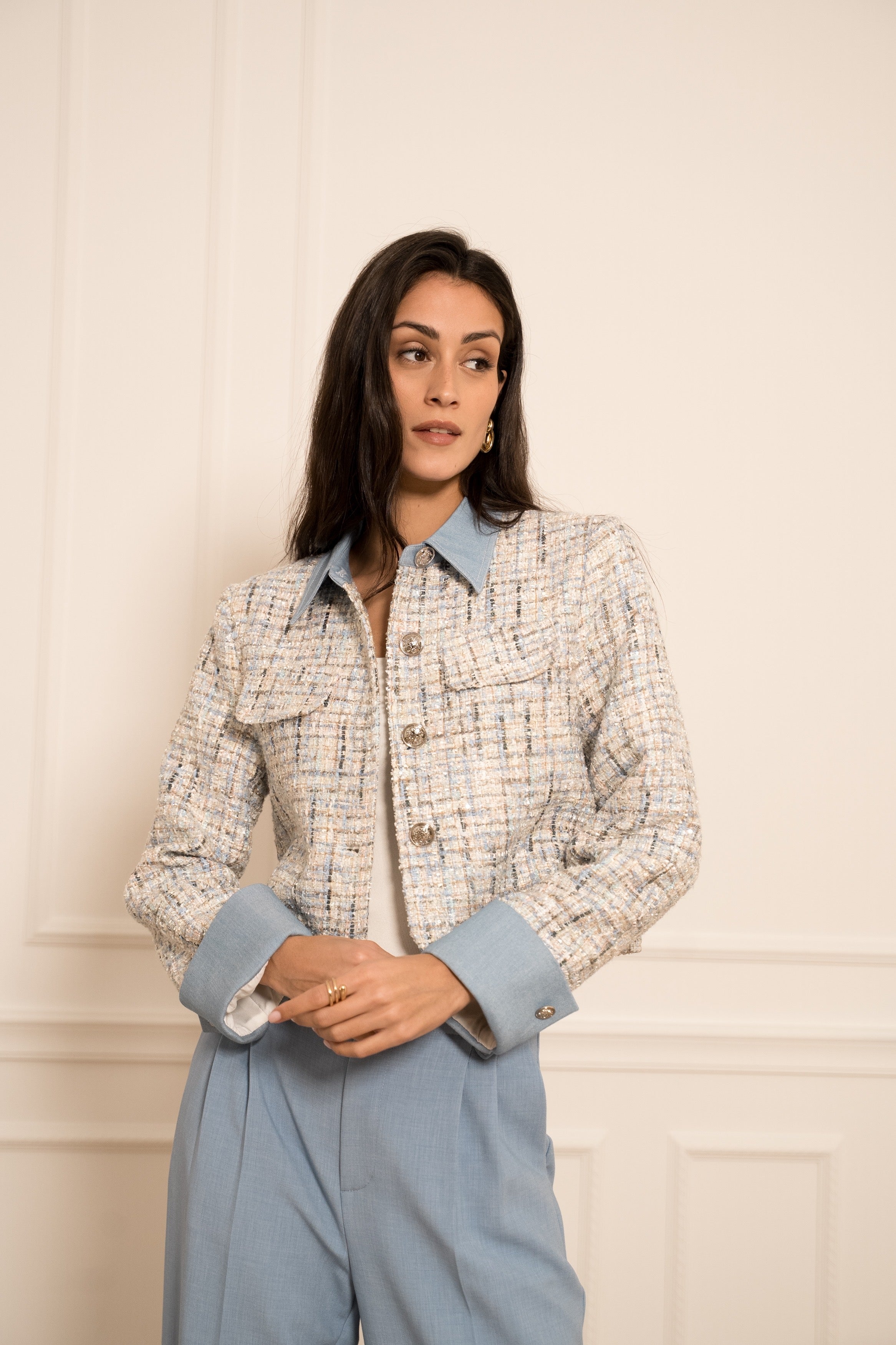 Cream tweed blazer with blue collar and cuffs - front view on model with trousers