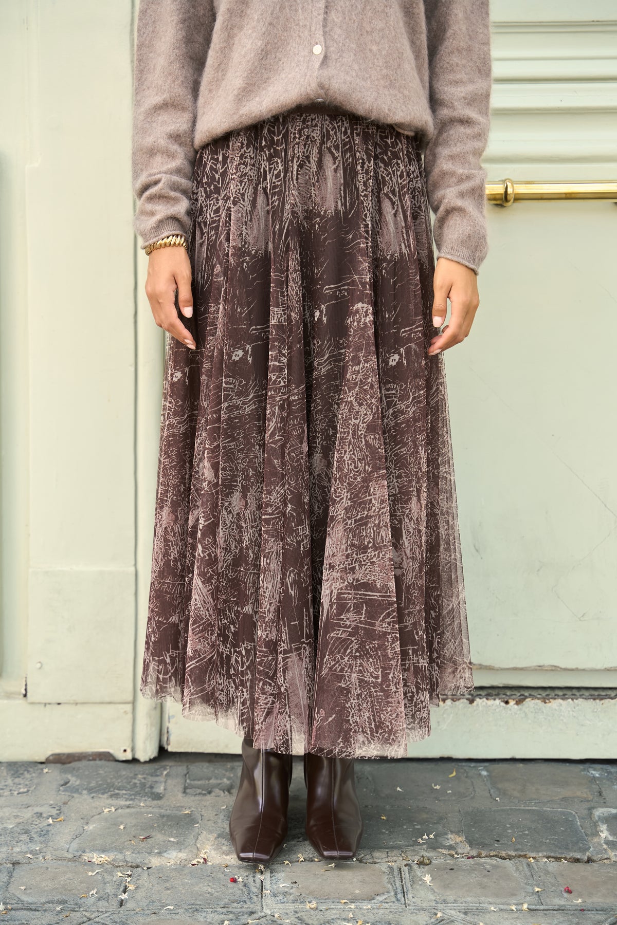 Women’s chocolate brown tulle midi skirt with soft pleats and artistic tonal print
