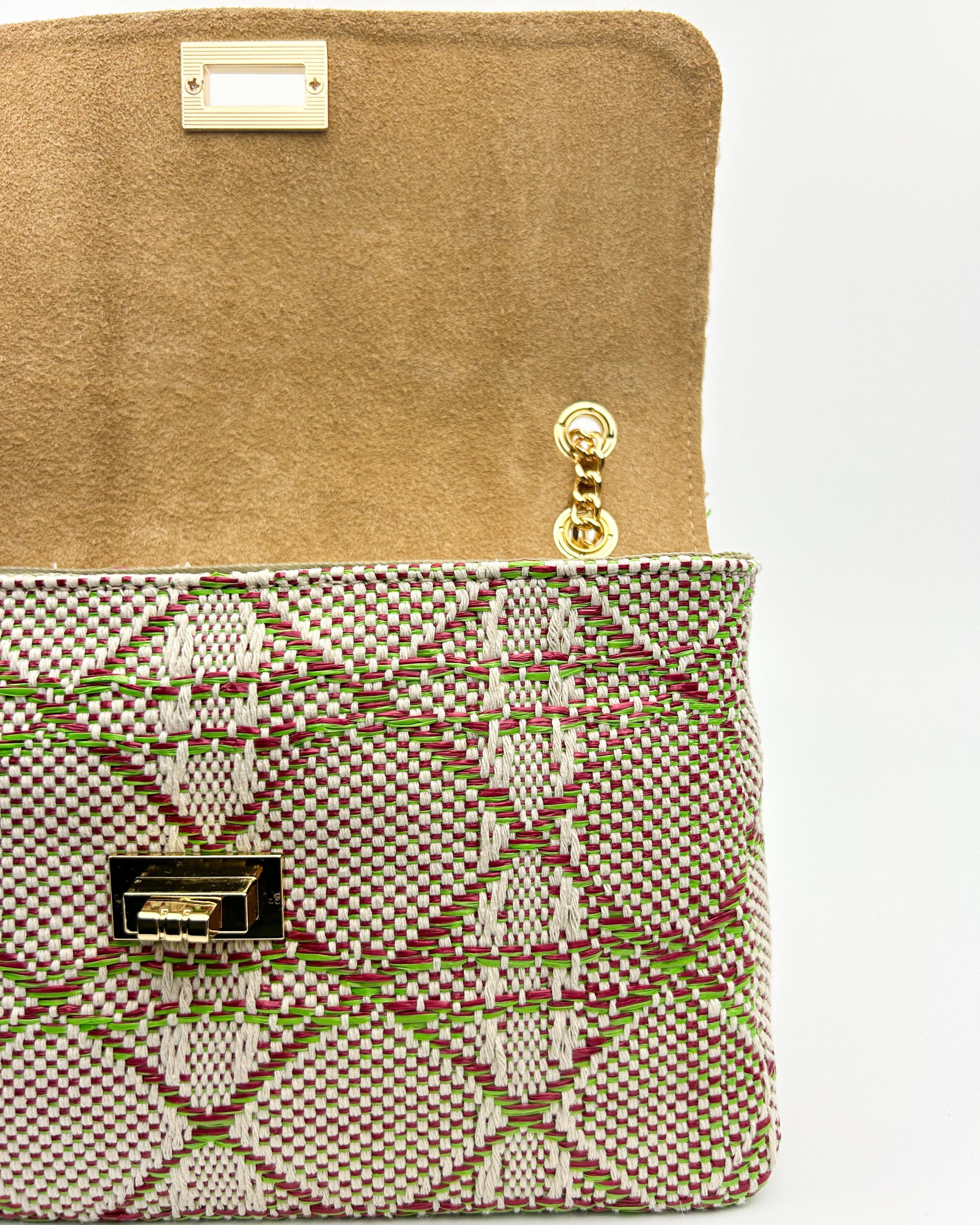 Inside view of Emma multicolour shoulder bag with zip closure, fabric lining, and compact everyday size