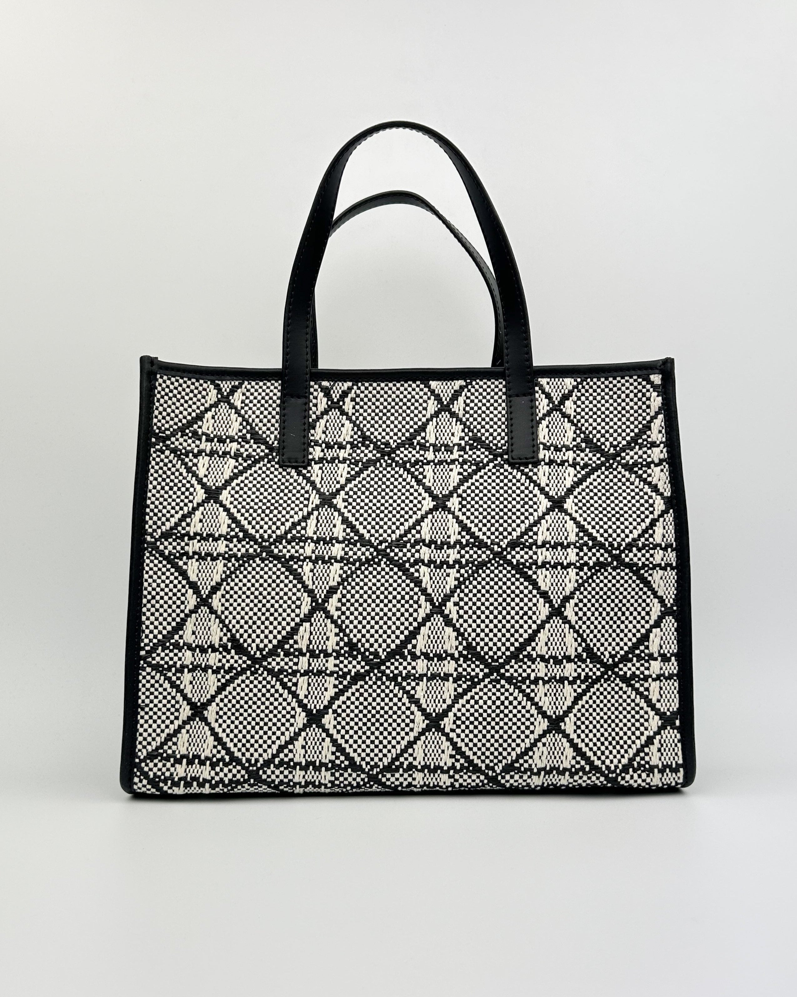 Emma Tote Bag in black and white woven fabric with black leather trim and top handle