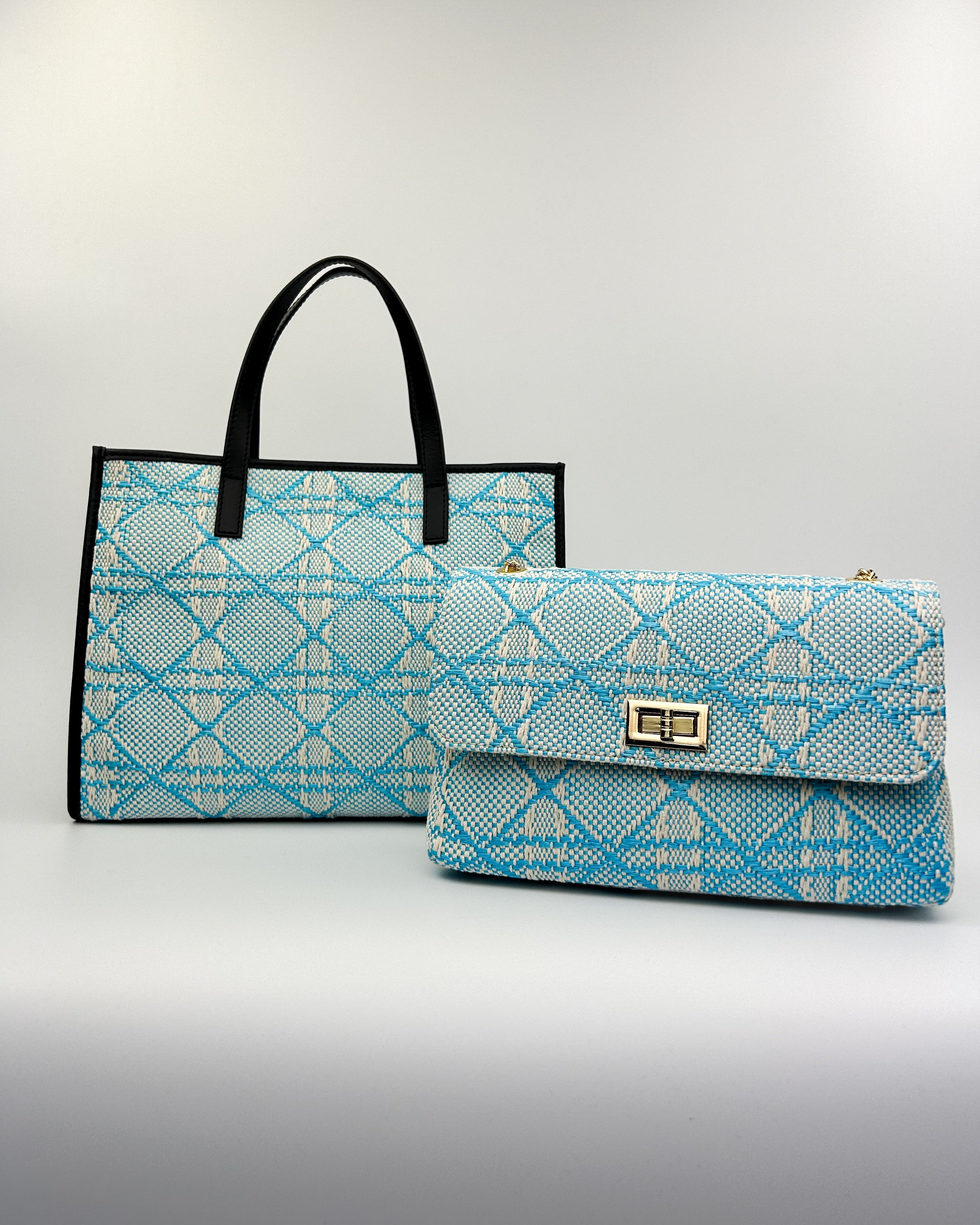 Chic and versatile blue Emma Tote, crafted from woven fabric and smooth leather.