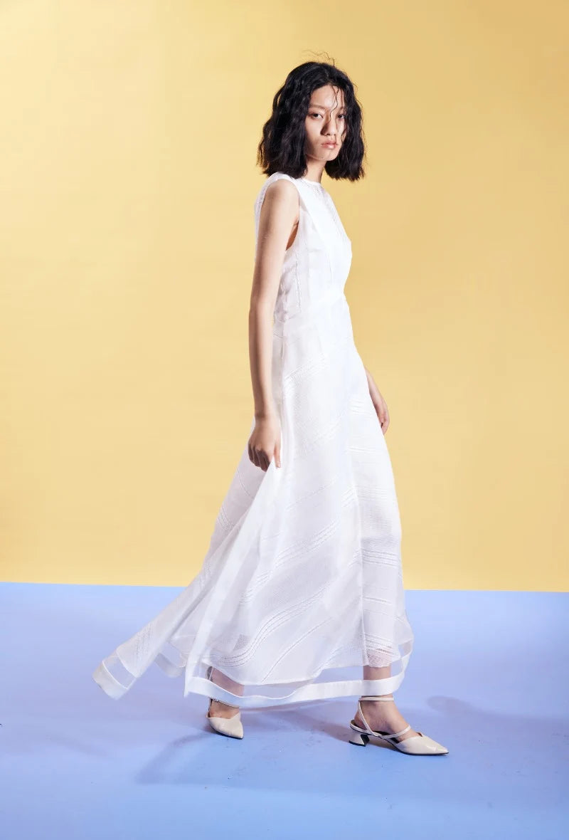 elegant A-line lace dress with sheer hem and clean silhouette