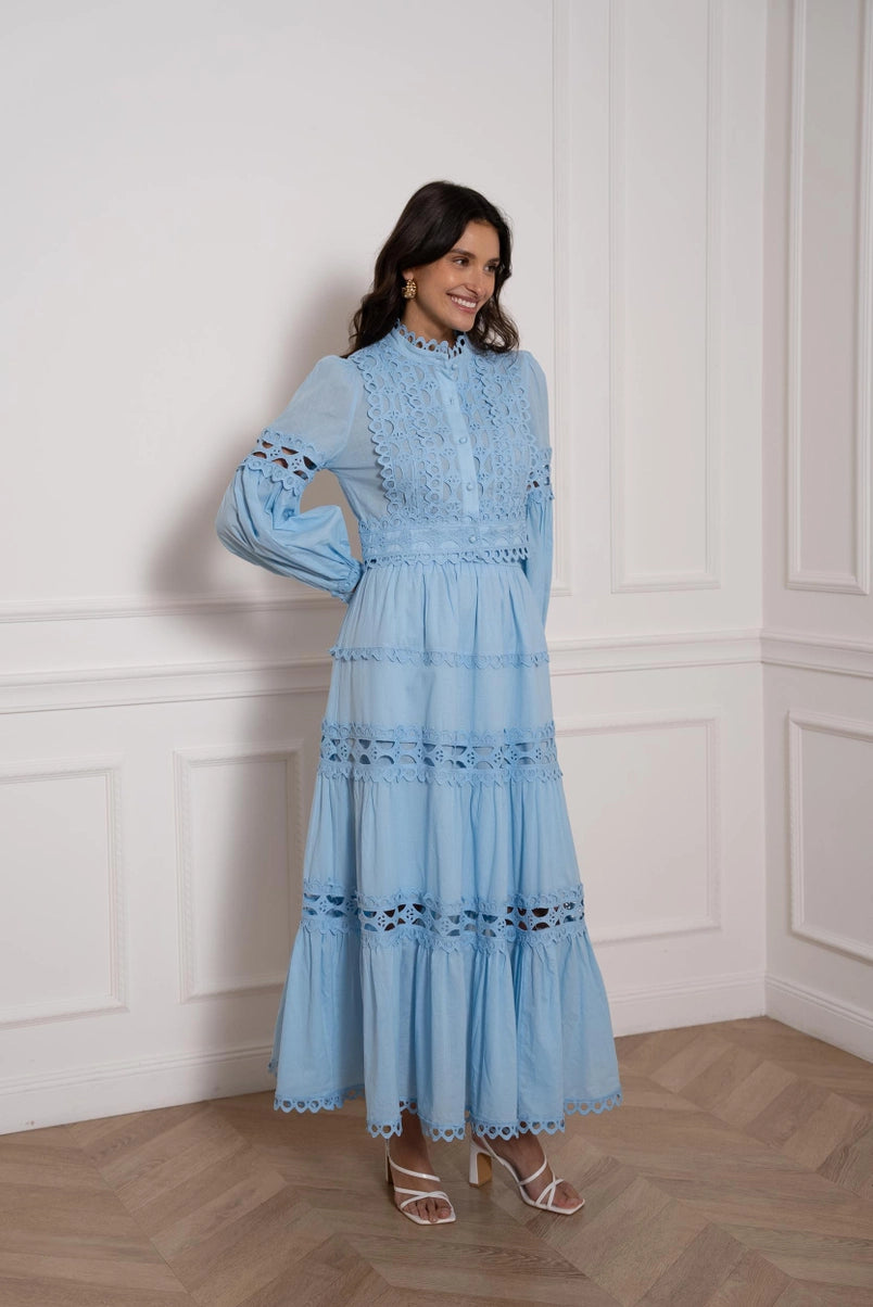 woman wearing blue cotton co-ord set with openwork lace