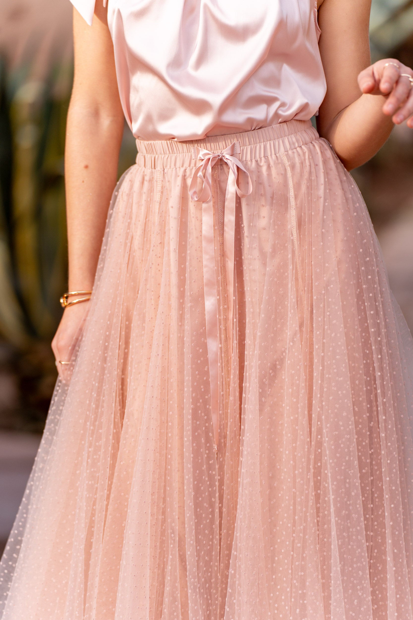 Blush tulle midi skirt with polka dot detailing — wedding guest outfit