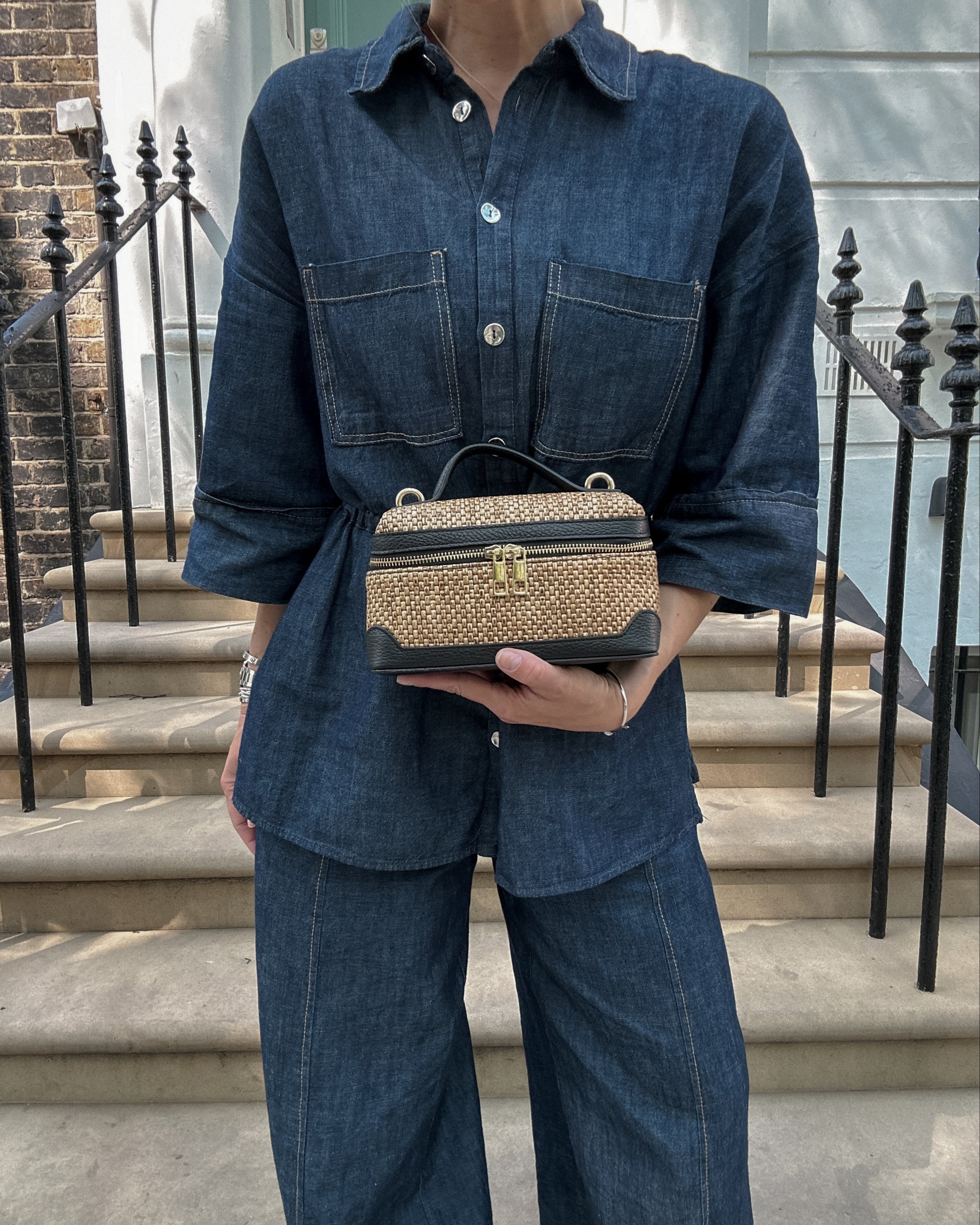 raffia vanity bag with leather trimming