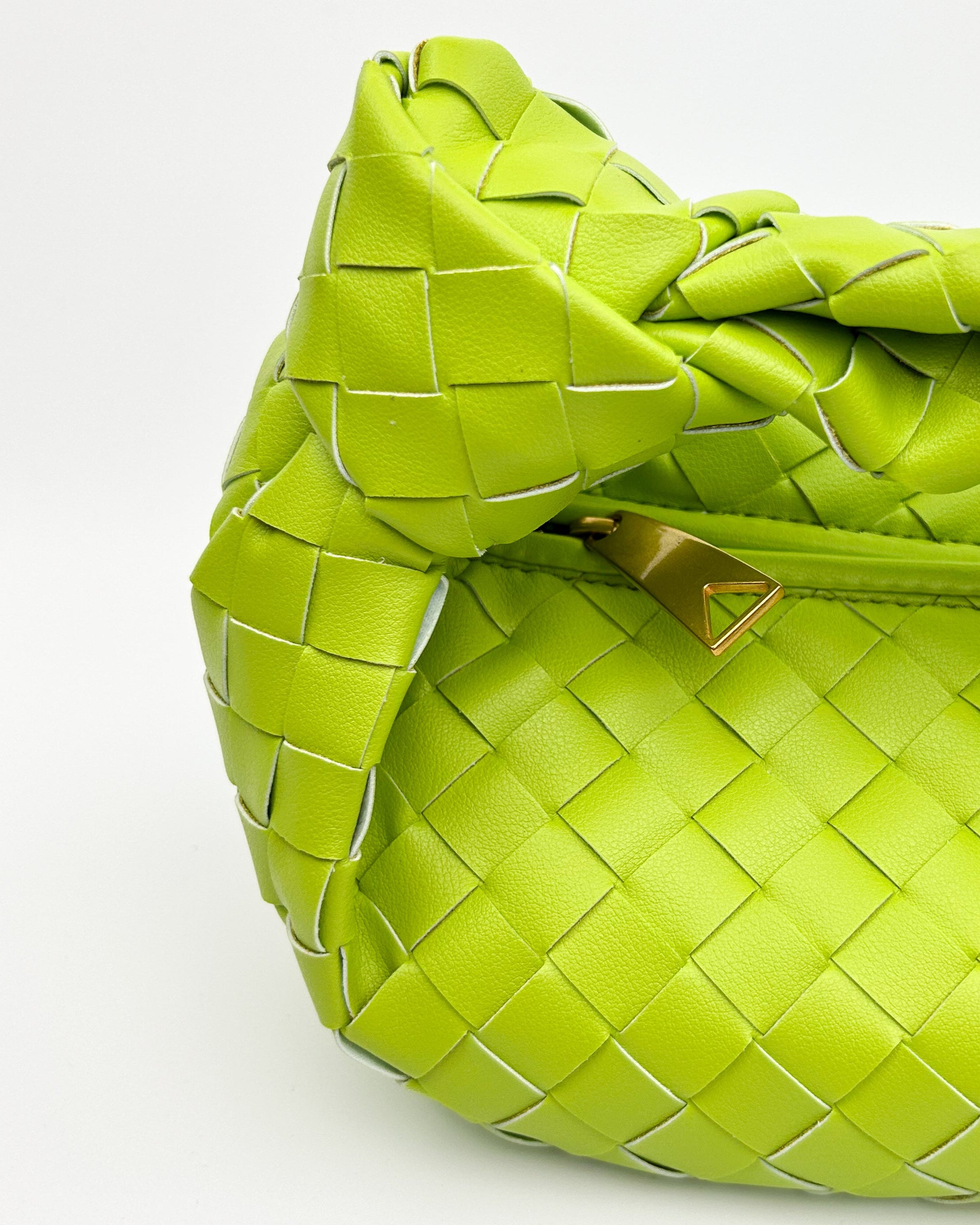 Back of The Knot Woven Bag in lime green – Italian woven leather handbag with bright colour and structured shape