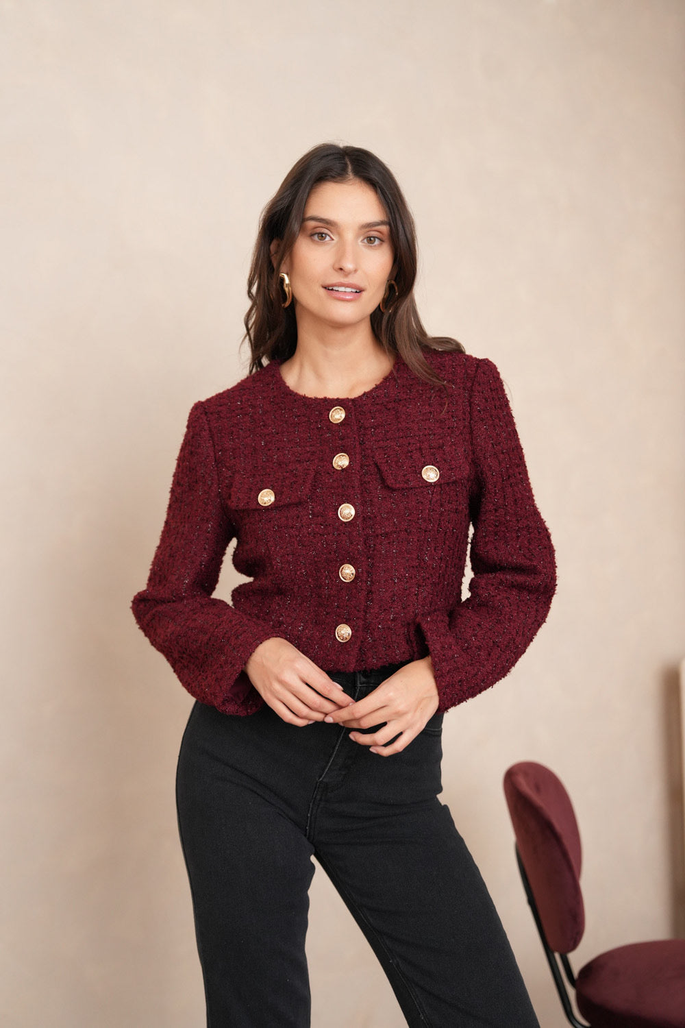Burgundy tweed blazer with gold buttons and collarless neckline - front view on model