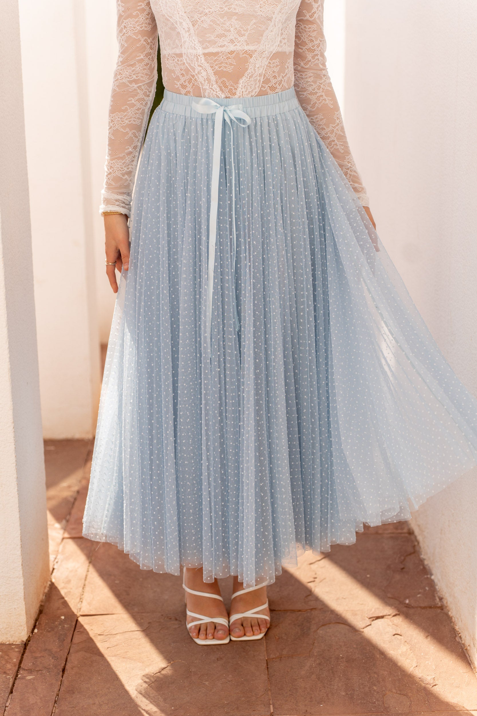 Soft blue tulle midi skirt with scattered polka dots — romantic party wear