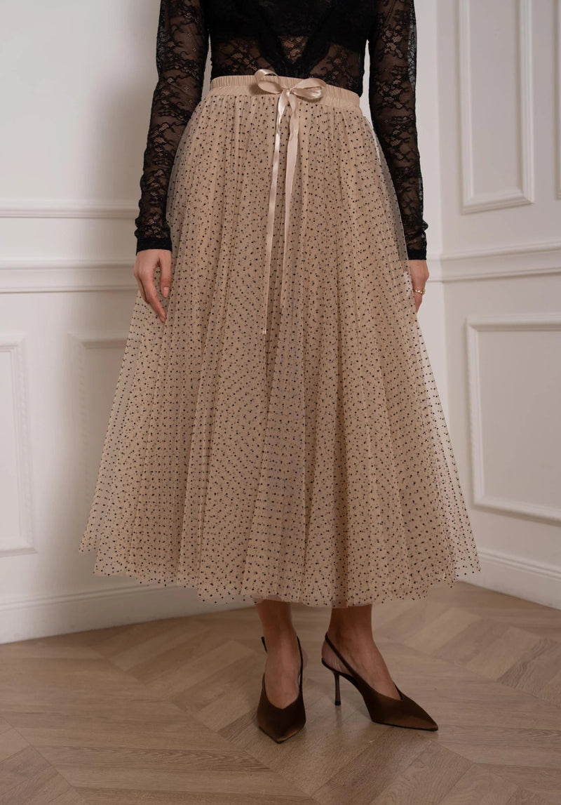 beige tulle skirt with black dots