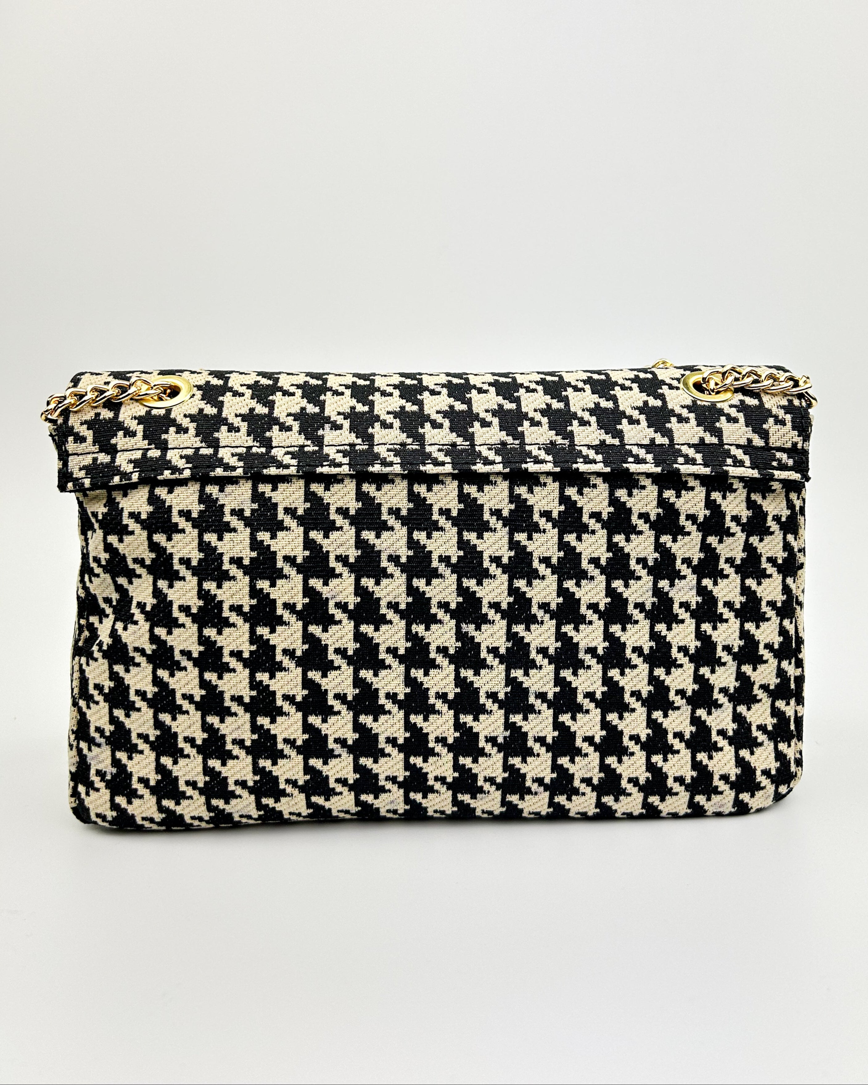 back view of Emma bag in black and white fabric with leather trim