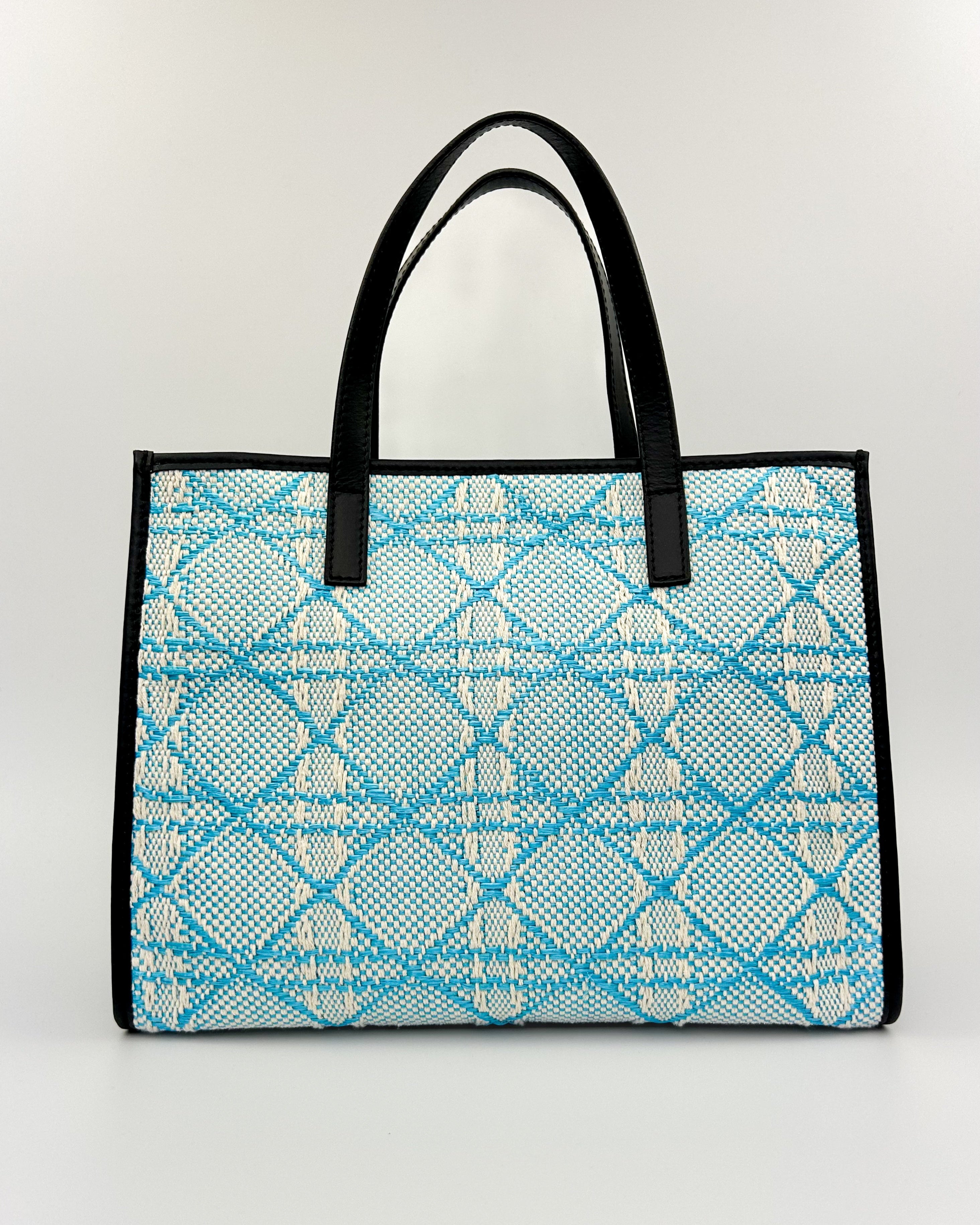 Emma Tote in blue woven fabric with refined leather accents and structured shape