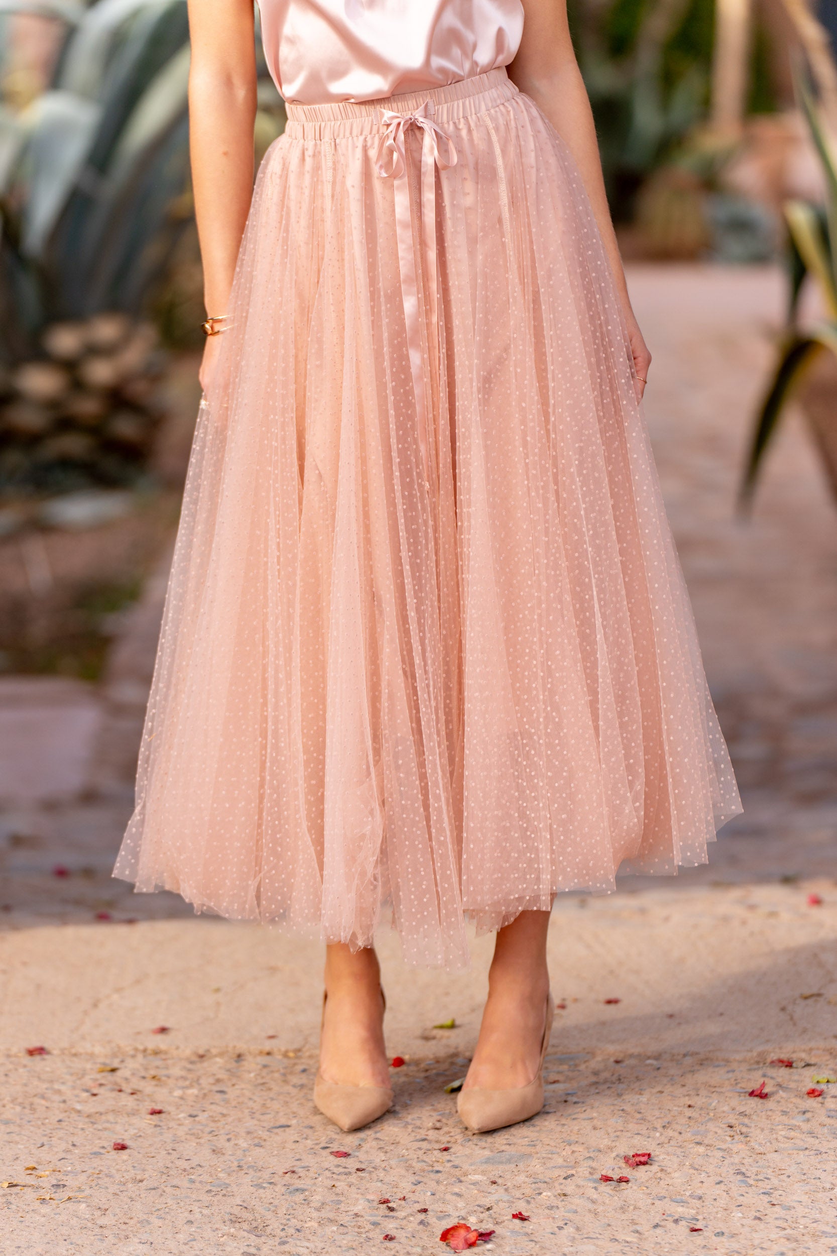 Pink polka dot tulle skirt full length view — romantic occasion wear

