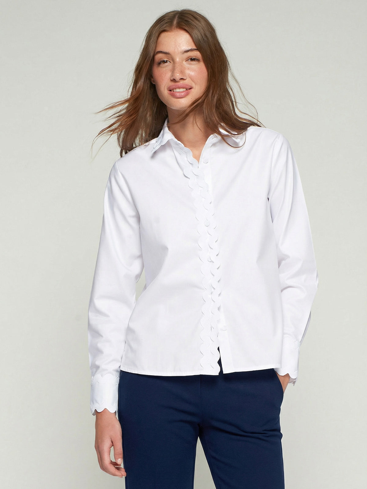 White Vilagallo shirt with scallop trim detailing and long sleeves