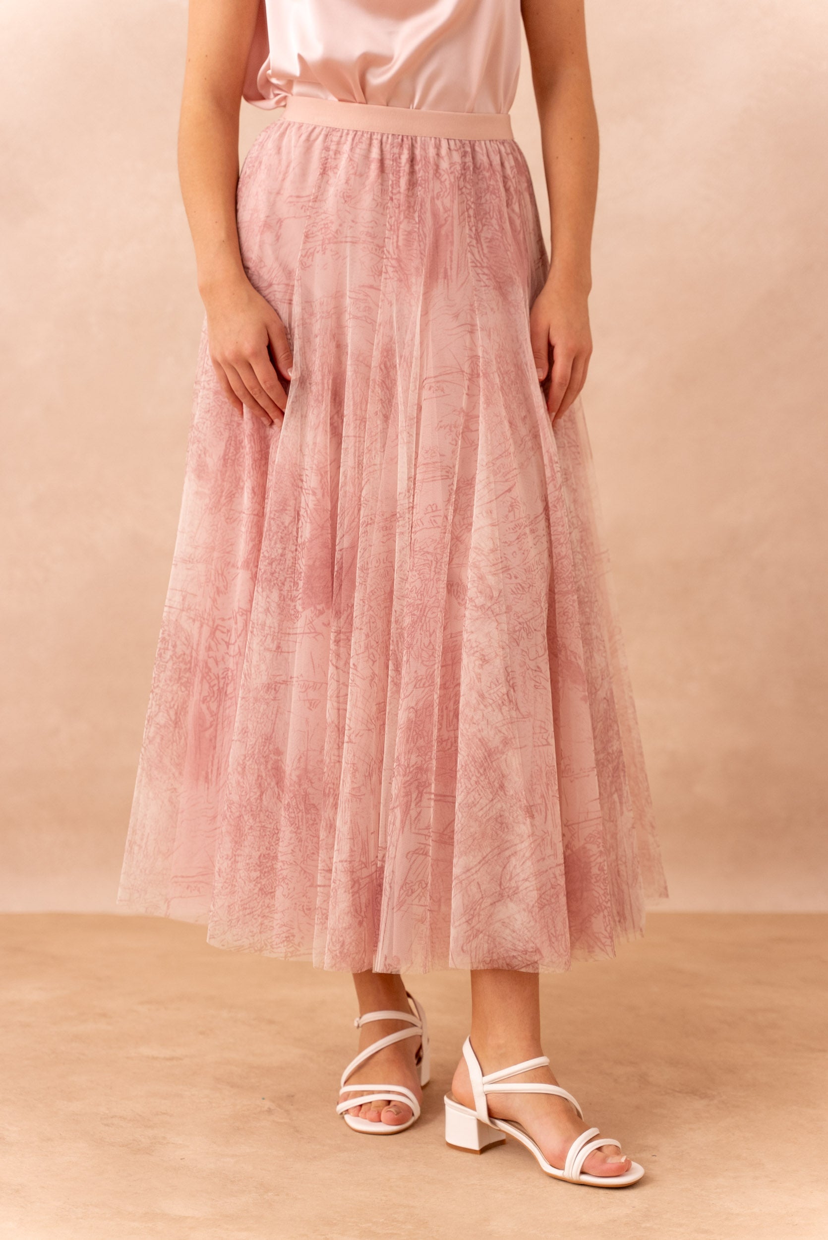 Blush pink layered tulle skirt with abstract print and elasticated waistband