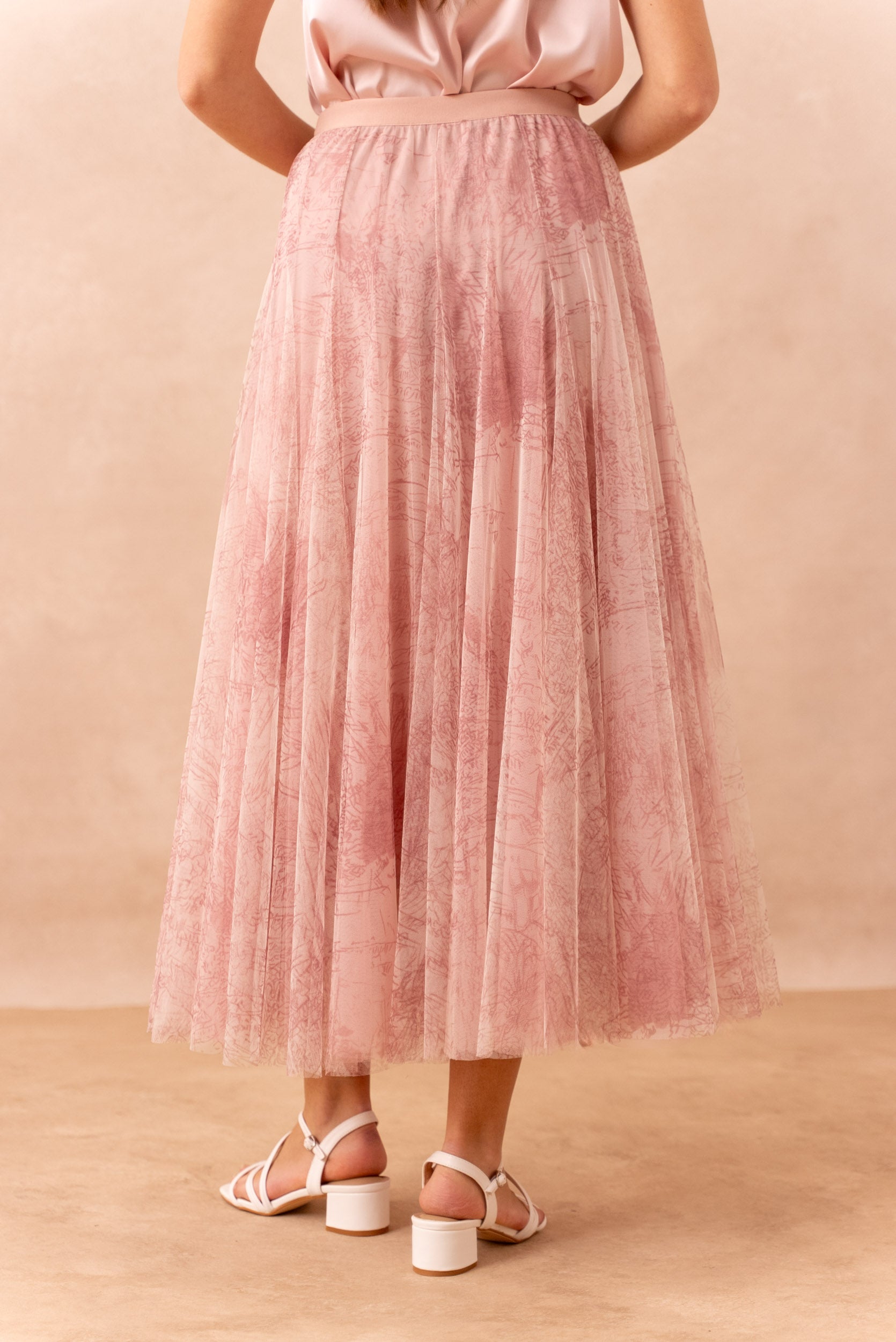 Lightweight printed tulle midi skirt with soft movement and feminine silhouette