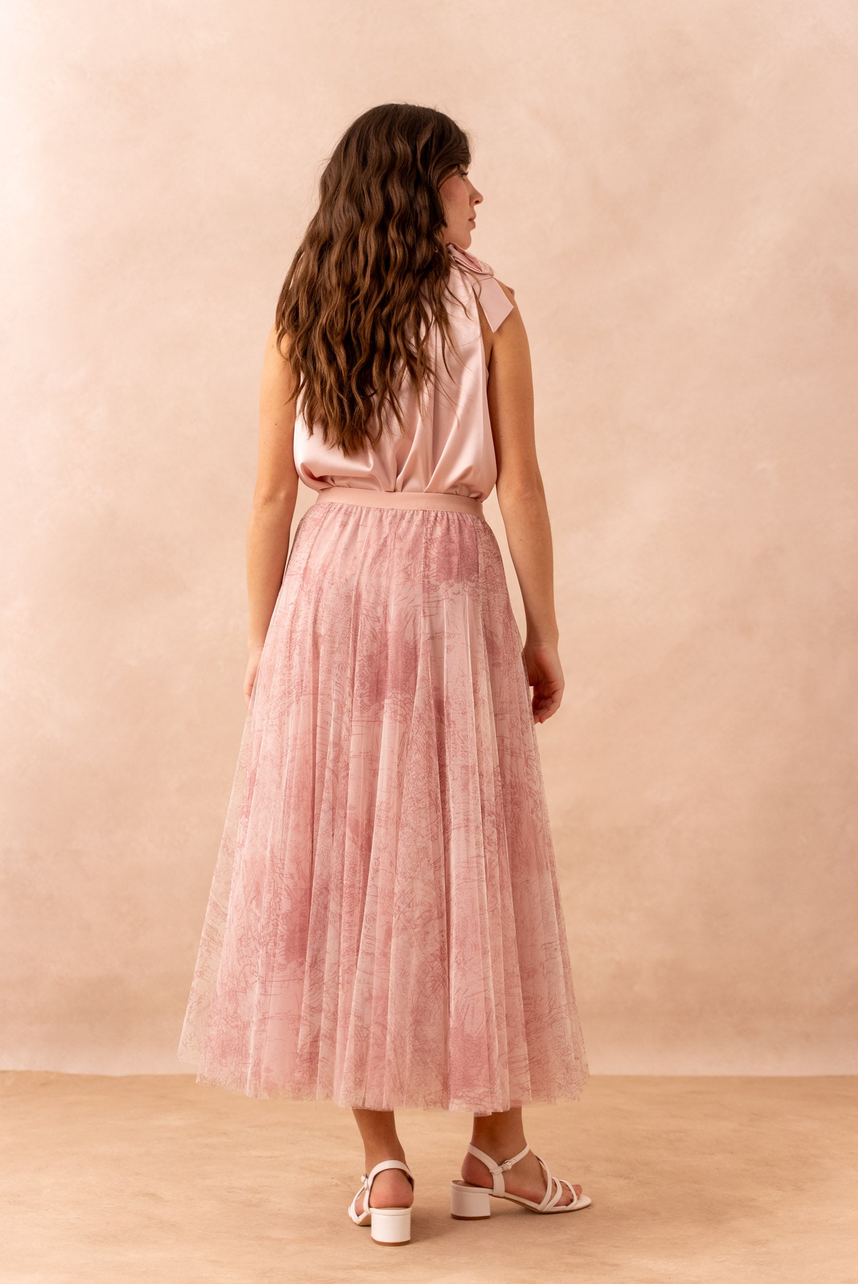 Elegant blush pink occasion skirt in layered sheer tulle with midi length
