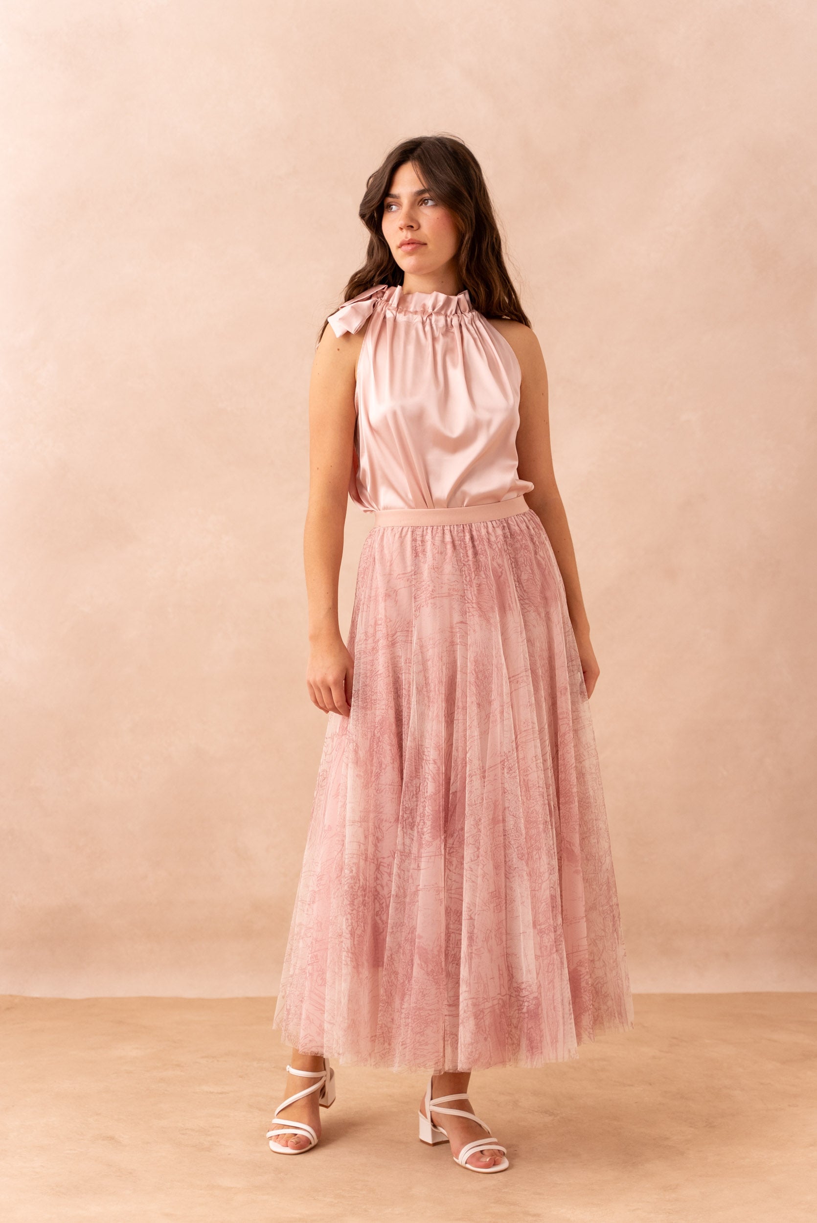 Pink printed tulle midi skirt with layered mesh and flowing silhouette