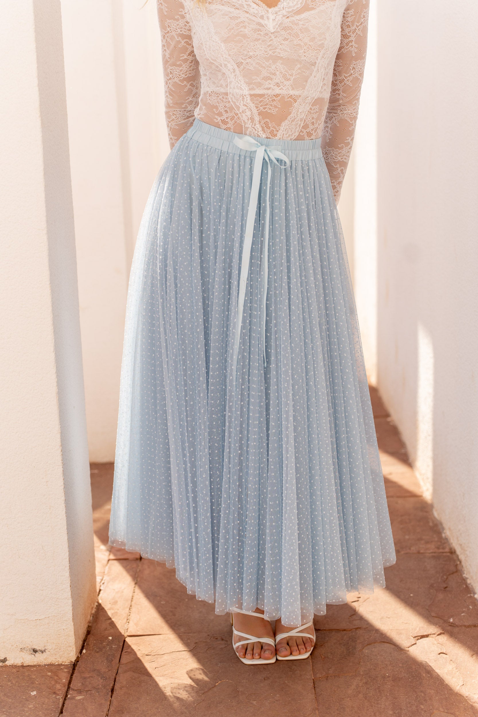Sky blue polka dot tulle skirt full length view — feminine occasion wear